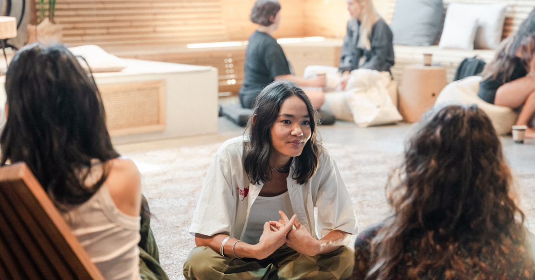 a woman with friends in a third place