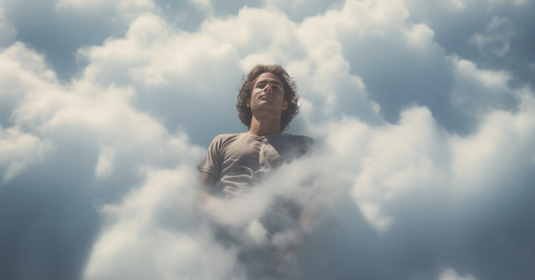 
  A man floating blissfully in the clouds
